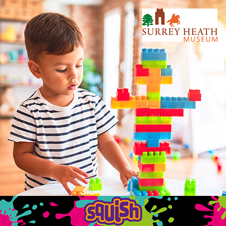 Toddler building with building blocks